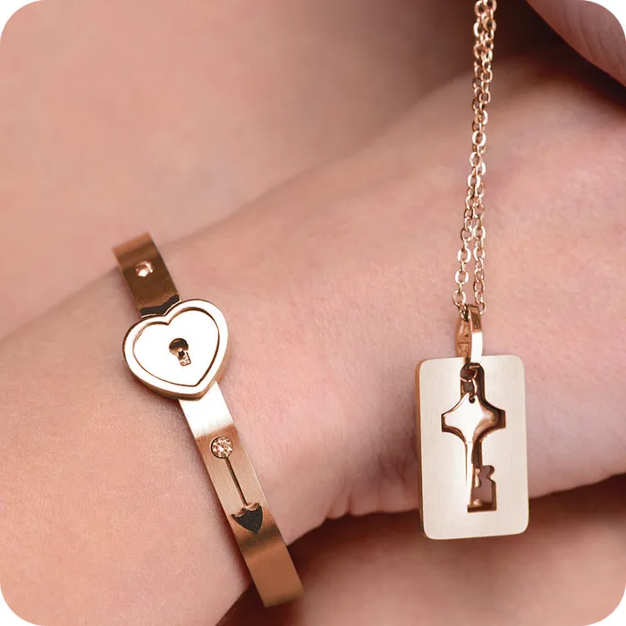 XR Brands Vibrators Cuffed Locking Bracelet Key Necklace in Rose Gold