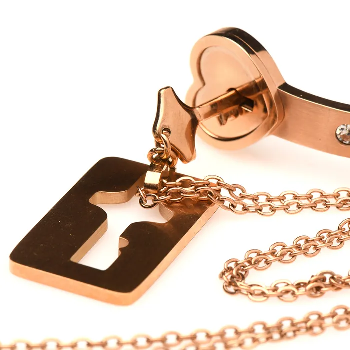 XR Brands Vibrators Cuffed Locking Bracelet Key Necklace in Rose Gold